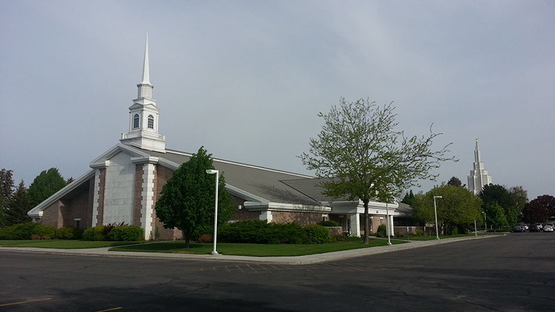 LDS Chapel with landscaping and red brick view from parking lot