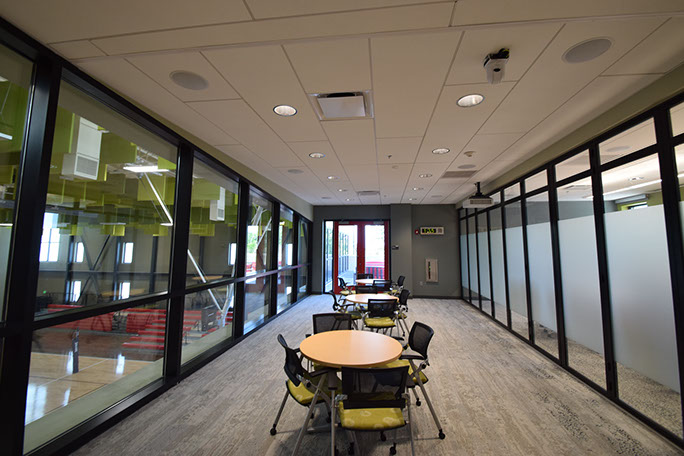 C. Mark Openshaw Education Center and Office Building work area and conference room