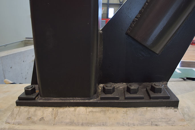 C. Mark Openshaw Education Center and Office Building x brace close up of baseplate and anchor bolts