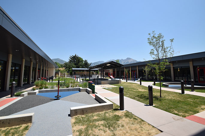 C. Mark Openshaw Education Center and Office Building courtyard play area