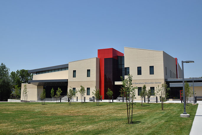 C. Mark Openshaw Education Center and Office Building south landscaping, lawn and stage