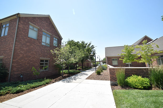 Rowland Hall-St. Mark's School between buildings sidewalk and landscaping