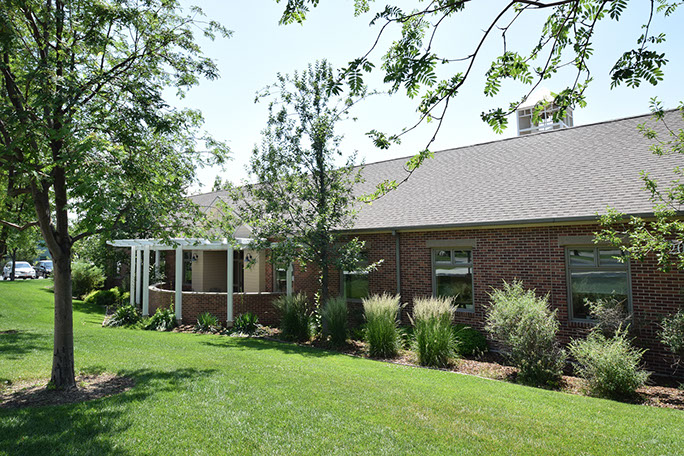 Rowland Hall-St. Mark's School classroom building with landscaping and trees