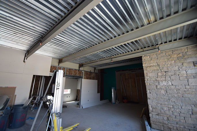 Utah State Univerisity Kaysville Campus interior transition between existing and new buildings under construction