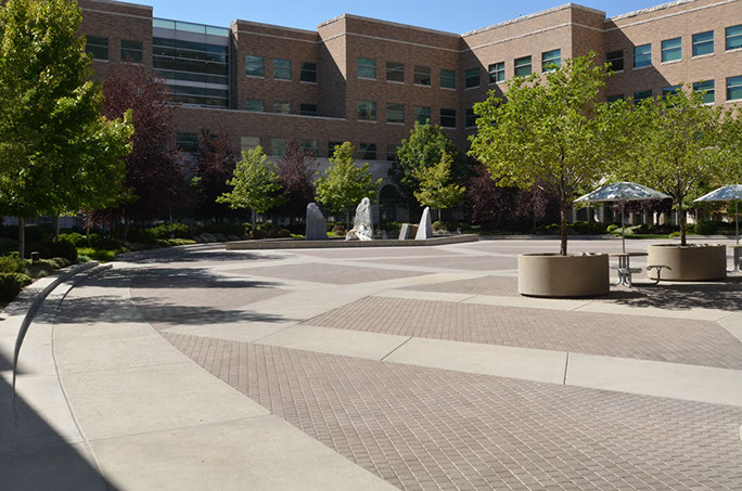 BYU Joseph F. Smith Building courtyard plaza with fountains and landscaping