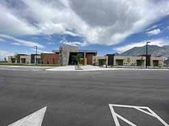 Utah Schools for the Deaf and Blind C. Mark Openshaw Education Center front with staircase and stage