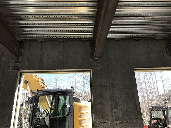 Stein Eriksen Lodge Expansion concrete beam over window openings