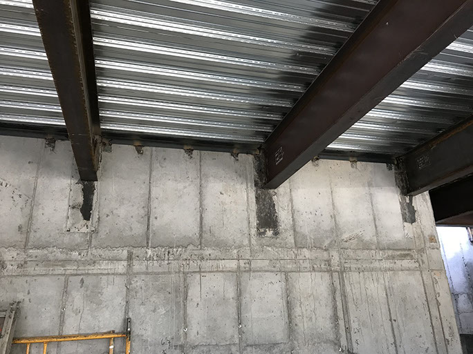 Stein Eriksen Lodge Expansion concrete wall with steel embed plates