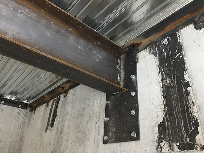 Stein Eriksen Lodge Expansion post installed plate in concrete wall