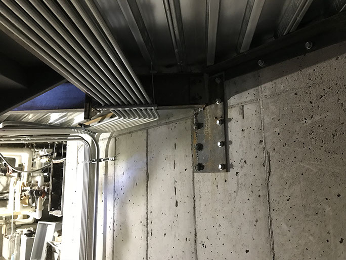 Stein Eriksen Lodge Expansion concrete wall with post installed steel plate