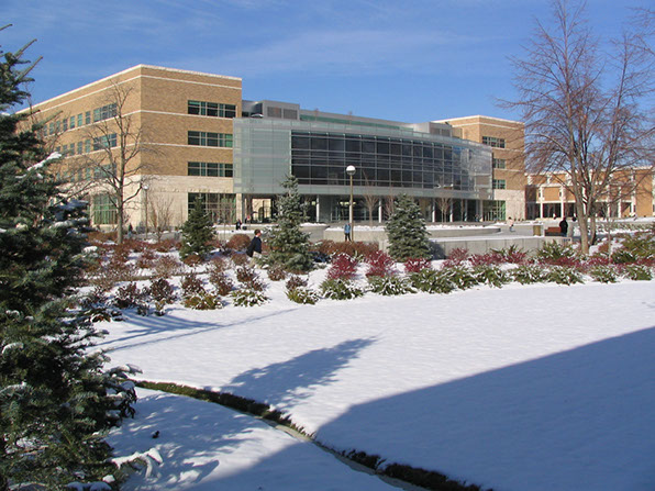 BYU Joseph F. Smith Building front facade with snow and landscaping