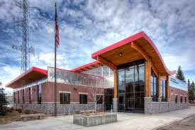 Teton County Law Enforcement Center front entrance with flag and curved roof