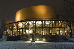 Southern Utah University Randall Jones Theatre front view at night with lights on inside