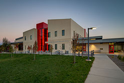 Utah Schools for the Deaf and Blind C. Mark Openshaw Education Center front with staircase and stage